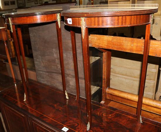 Pair of mahogany demi lune tables